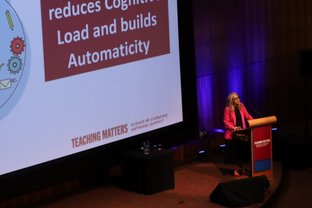 Dr Lorraine Hammond AM on stage presenting at Teaching Matters